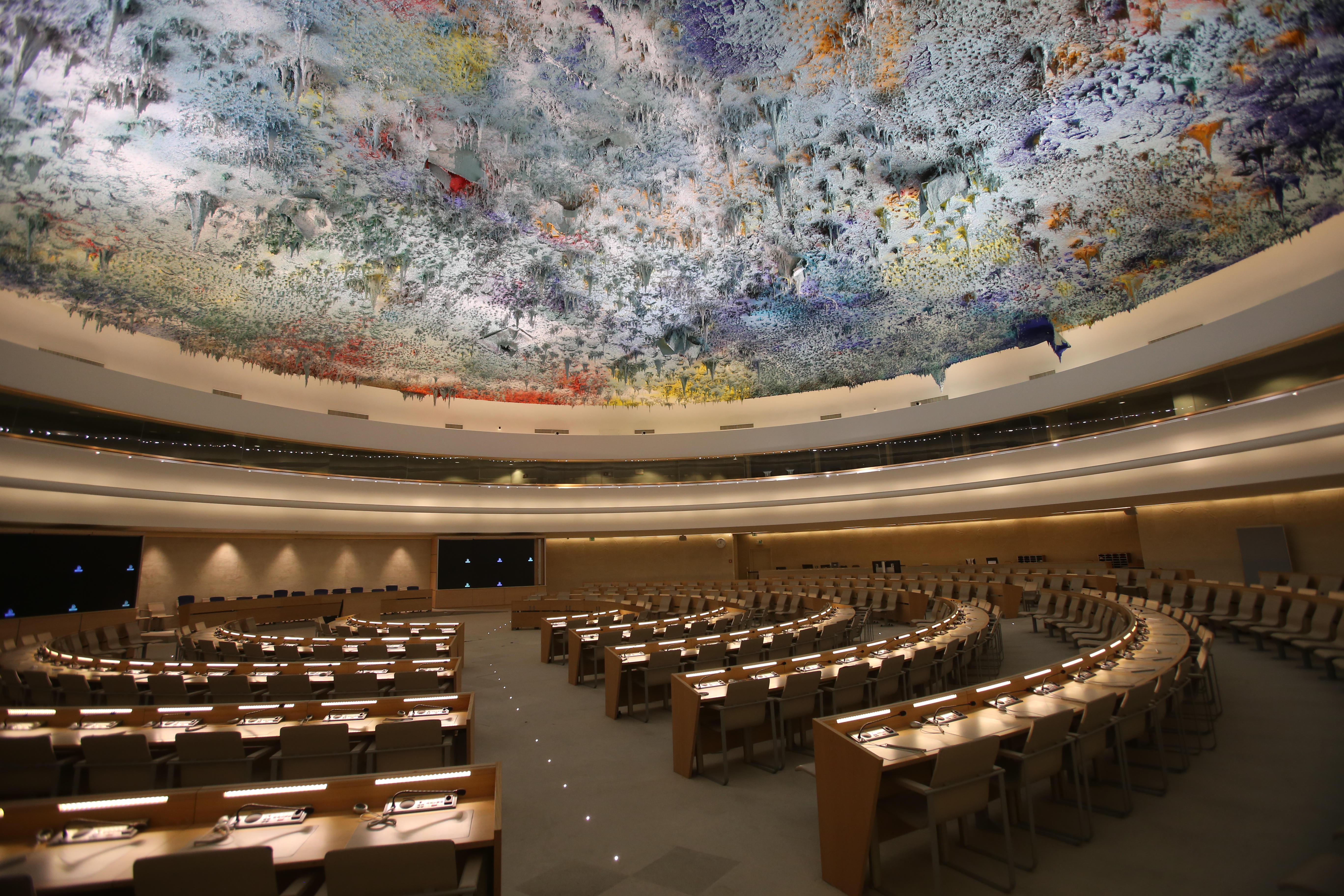 Photo: Human Rights and Alliance of Civilizations Room of the Palace of Nations, Geneva (Switzerland). It is the meeting room of the United Nations Human Rights Council. Author: Ludovic Courtès. Source: Wikicommons: https://commons.wikimedia.org/wiki/File:UN_Geneva_Human_Rights_and_Alliance_of_Civilizations_Room.jpg